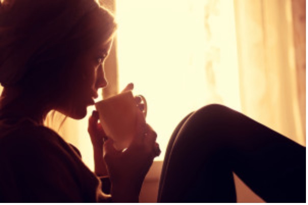 Woman Sensually Drinking Coffee